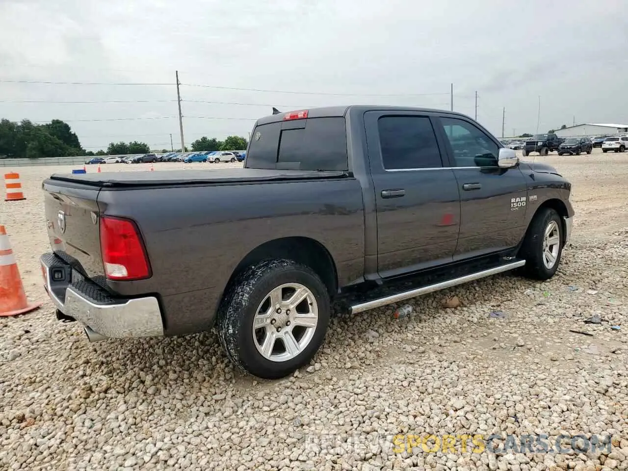 3 Photograph of a damaged car 1C6RR6LT5KS586523 RAM 1500 2019