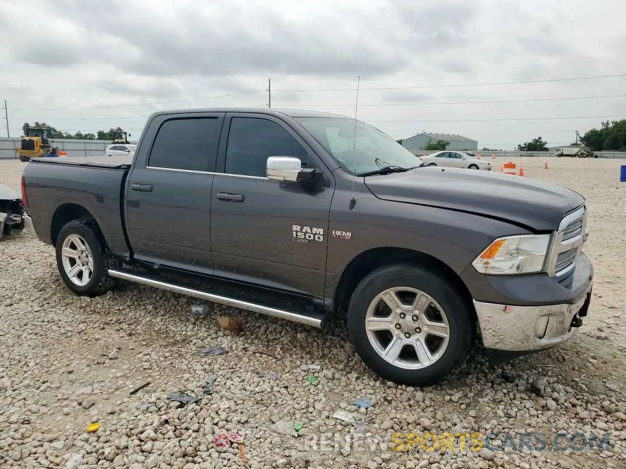 4 Photograph of a damaged car 1C6RR6LT5KS586523 RAM 1500 2019