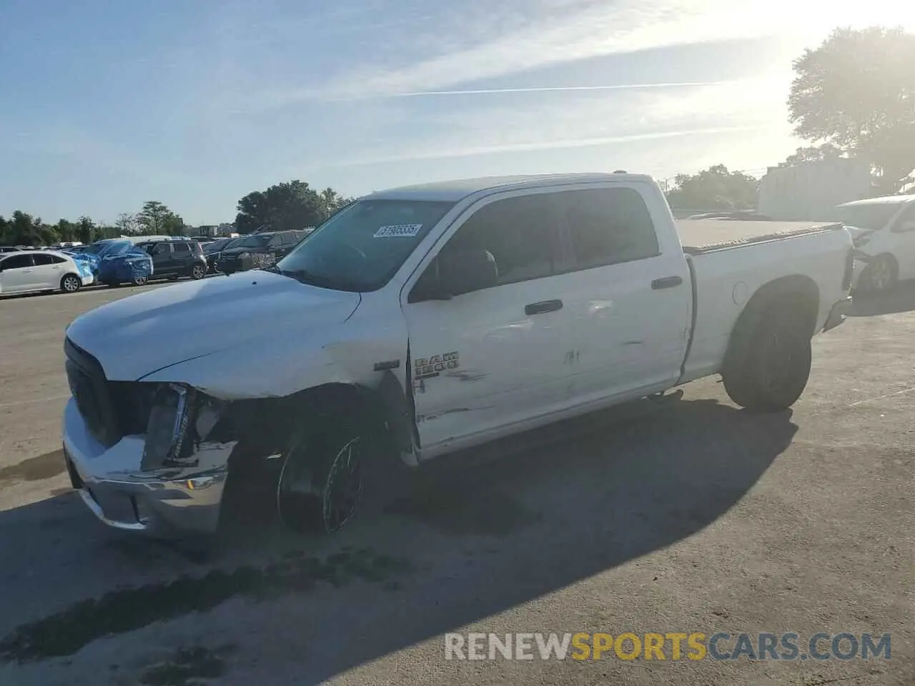 1 Photograph of a damaged car 1C6RR6TT5KS678425 RAM 1500 2019