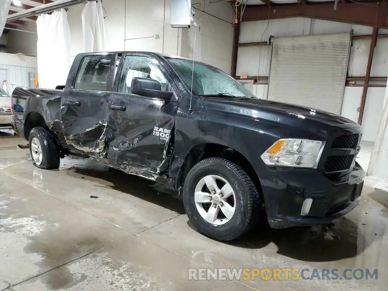 4 Photograph of a damaged car 1C6RR7FG1KS543415 RAM 1500 2019