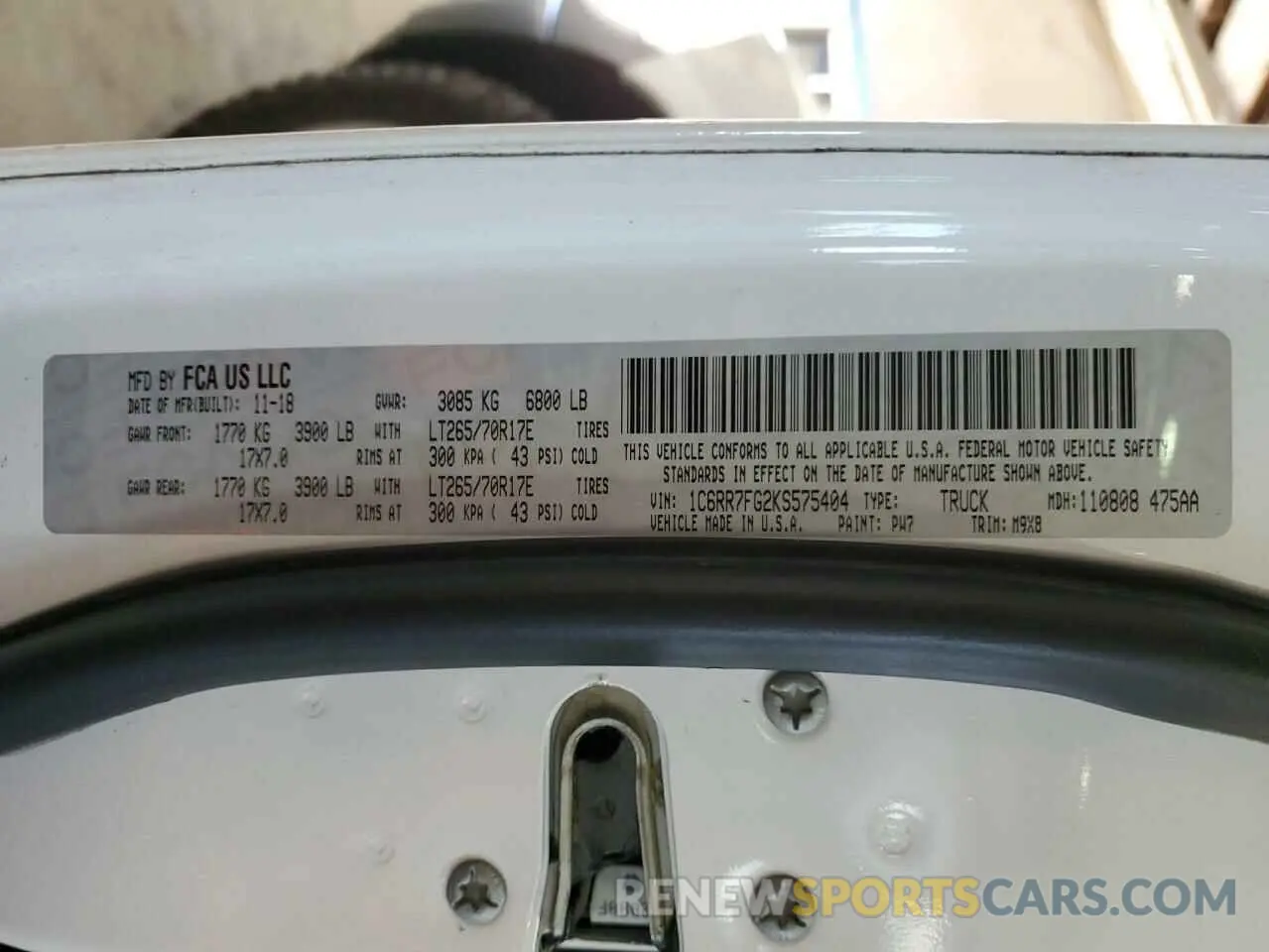 14 Photograph of a damaged car 1C6RR7FG2KS575404 RAM 1500 2019