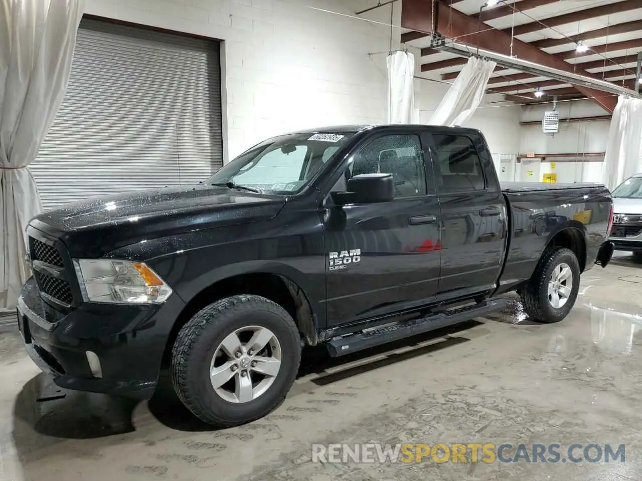 1 Photograph of a damaged car 1C6RR7FG4KS502972 RAM 1500 2019