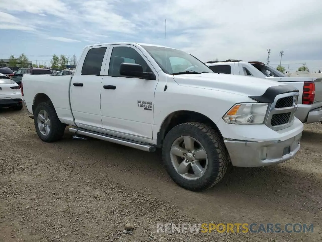 4 Photograph of a damaged car 1C6RR7FG5KS594755 RAM 1500 2019
