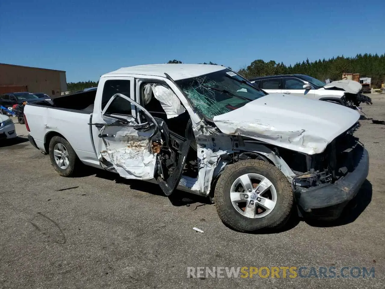 4 Photograph of a damaged car 1C6RR7FGXKS609704 RAM 1500 2019