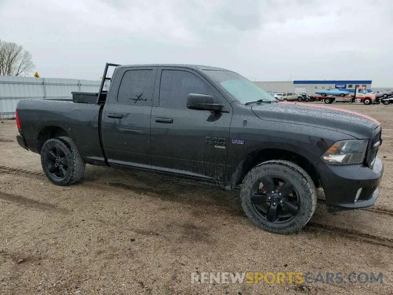 4 Photograph of a damaged car 1C6RR7FT0KS553625 RAM 1500 2019