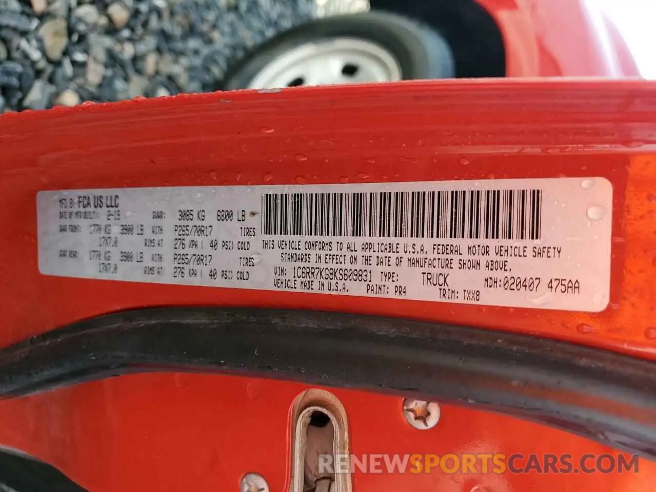 12 Photograph of a damaged car 1C6RR7KG9KS609831 RAM 1500 2019