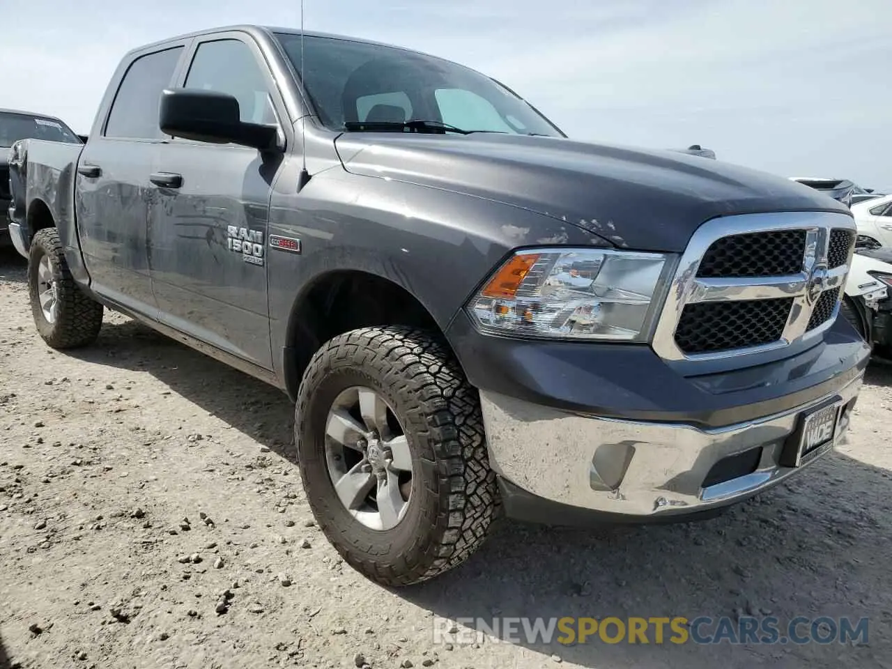 4 Photograph of a damaged car 1C6RR7KM3KS682392 RAM 1500 2019