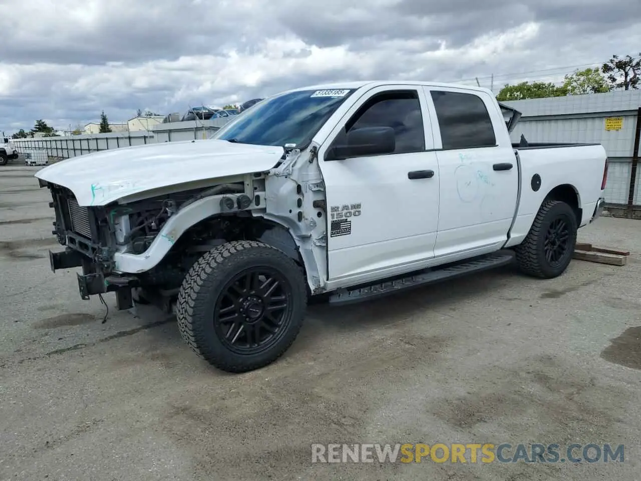 1 Photograph of a damaged car 1C6RR7KM9KS725388 RAM 1500 2019