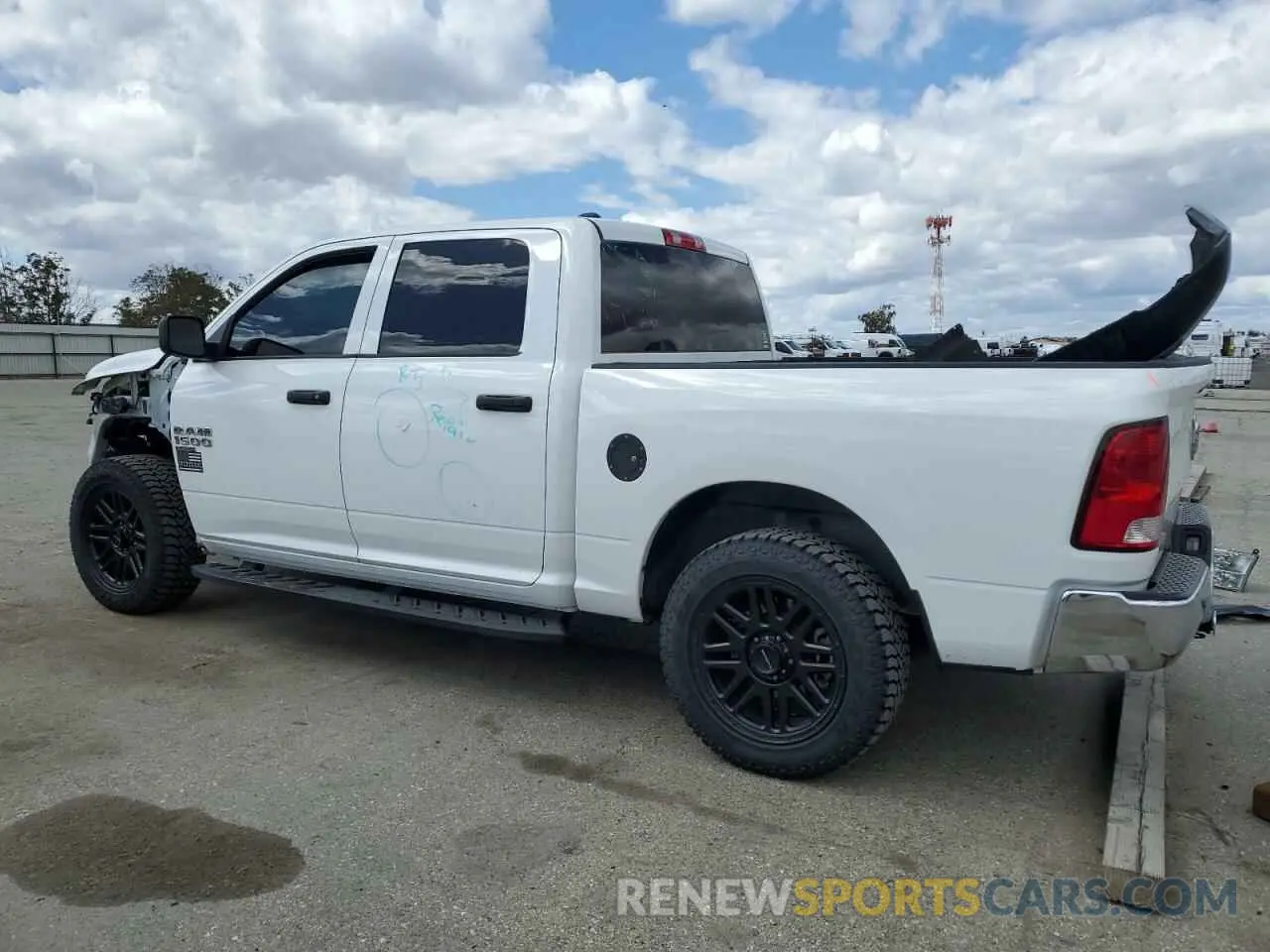2 Photograph of a damaged car 1C6RR7KM9KS725388 RAM 1500 2019