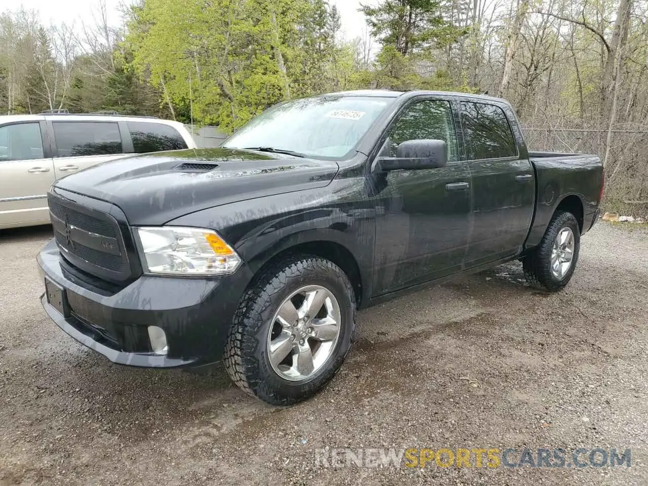1 Photograph of a damaged car 1C6RR7KT0KS679568 RAM 1500 2019