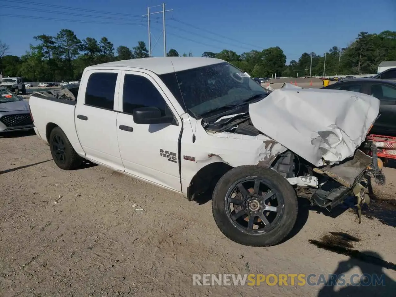 4 Photograph of a damaged car 1C6RR7KT3KS532774 RAM 1500 2019