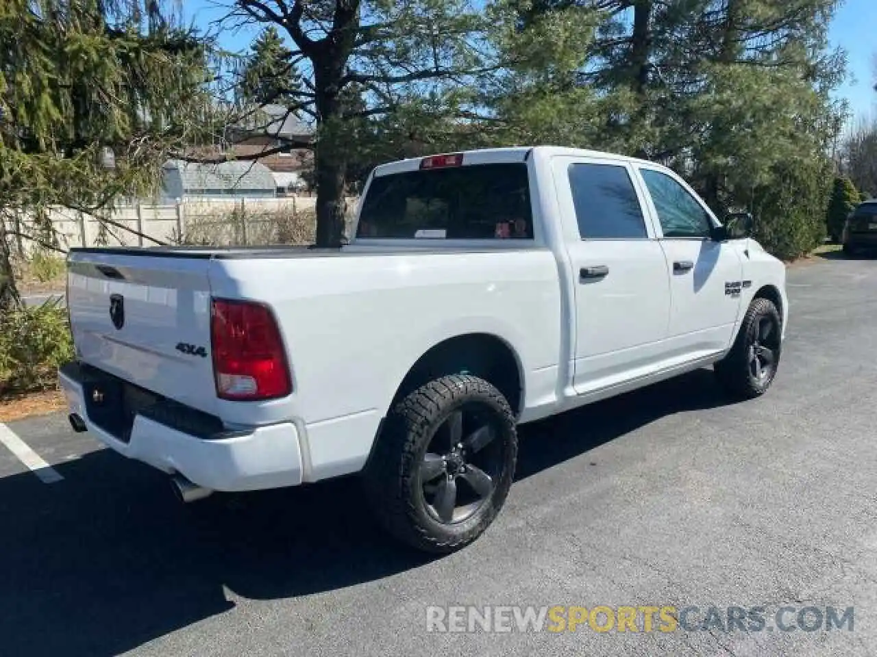 4 Photograph of a damaged car 1C6RR7KT3KS542169 RAM 1500 2019