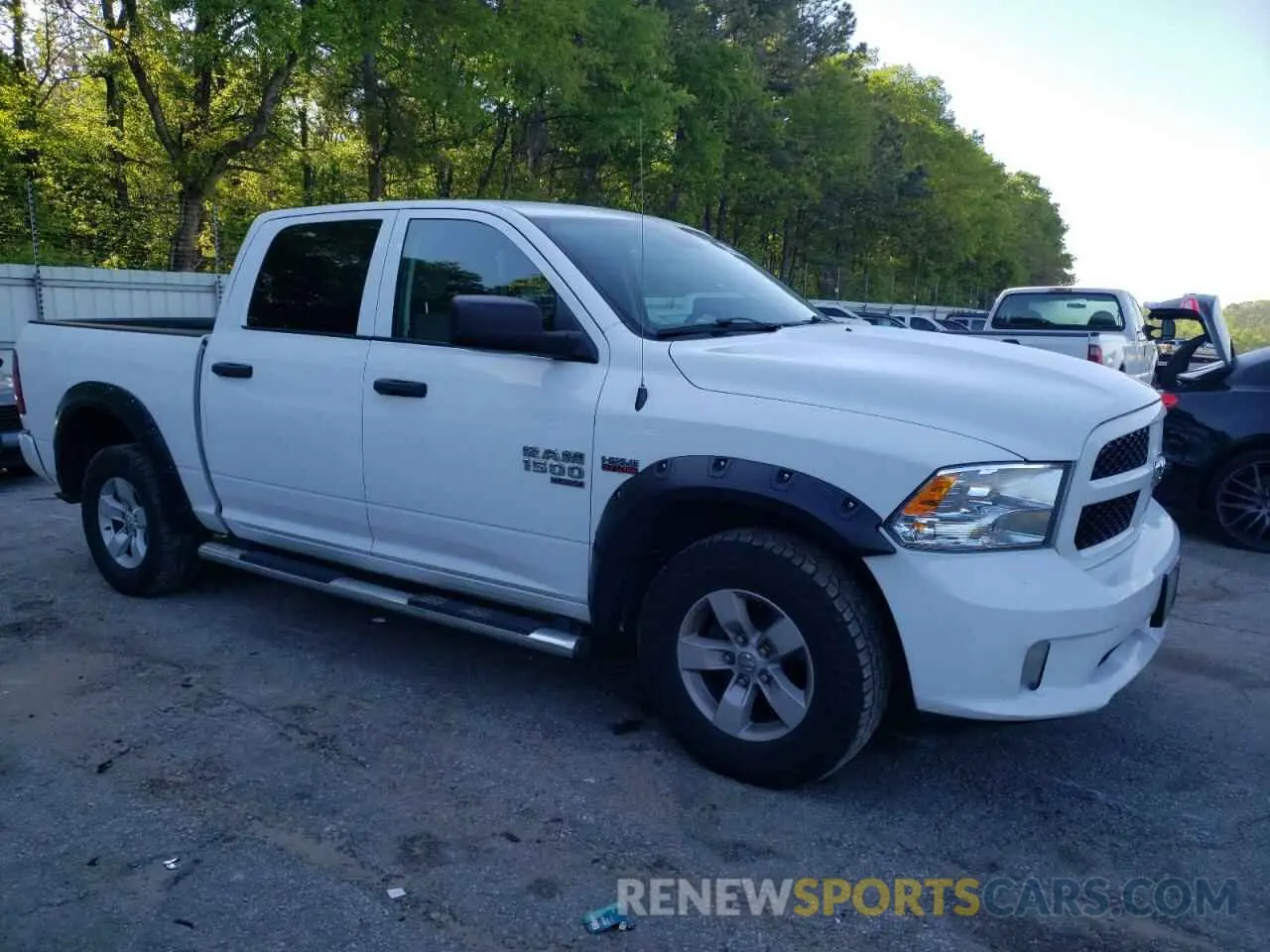 4 Photograph of a damaged car 1C6RR7KT9KS646990 RAM 1500 2019