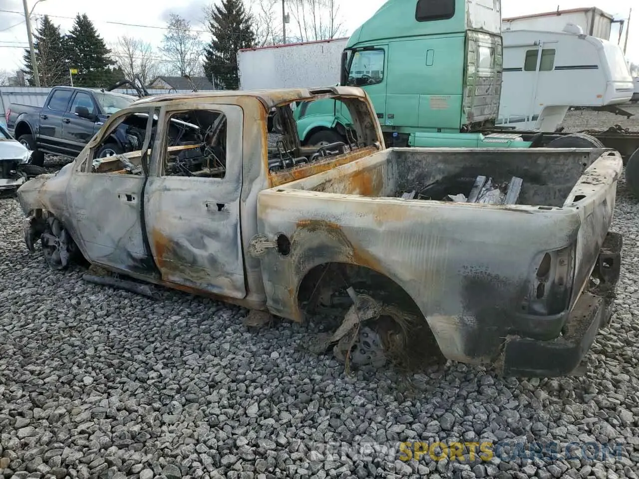 2 Photograph of a damaged car 1C6RR7LM0KS669257 RAM 1500 2019