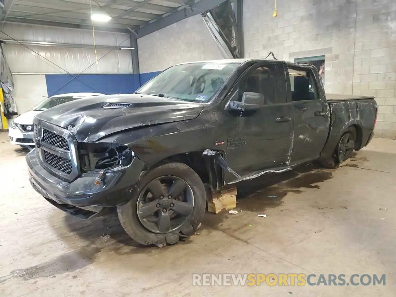 1 Photograph of a damaged car 1C6RR7LT0KS569845 RAM 1500 2019