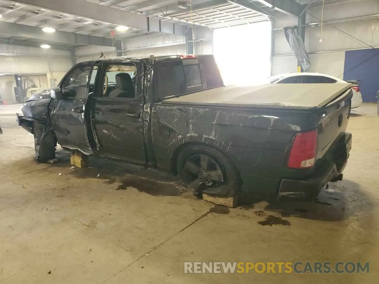 2 Photograph of a damaged car 1C6RR7LT0KS569845 RAM 1500 2019