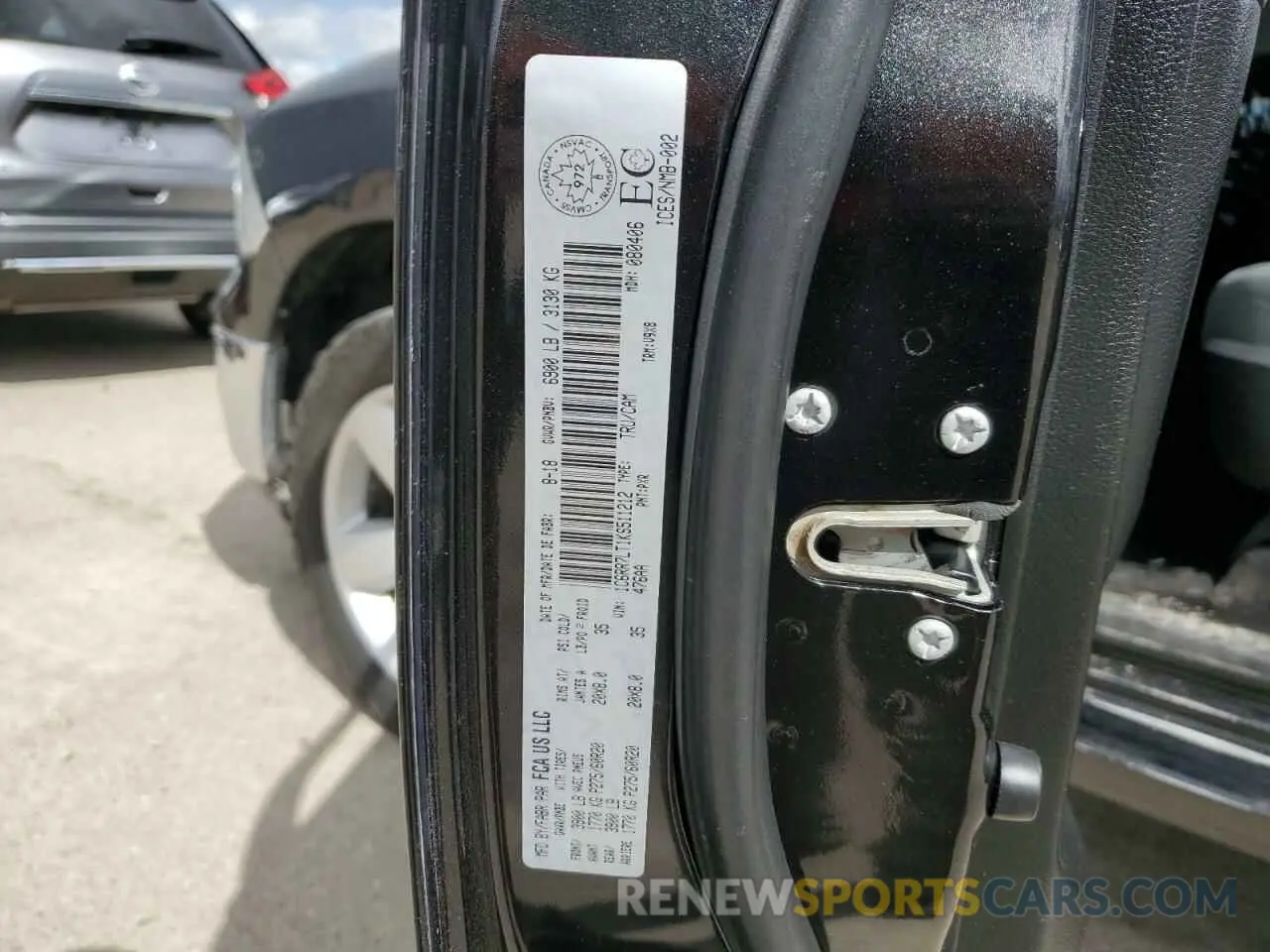 12 Photograph of a damaged car 1C6RR7LT1KS511212 RAM 1500 2019
