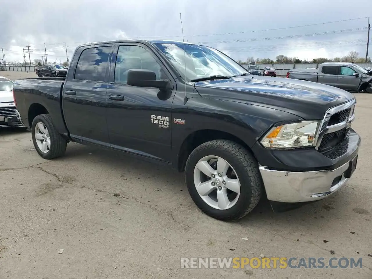 4 Photograph of a damaged car 1C6RR7LT1KS511212 RAM 1500 2019