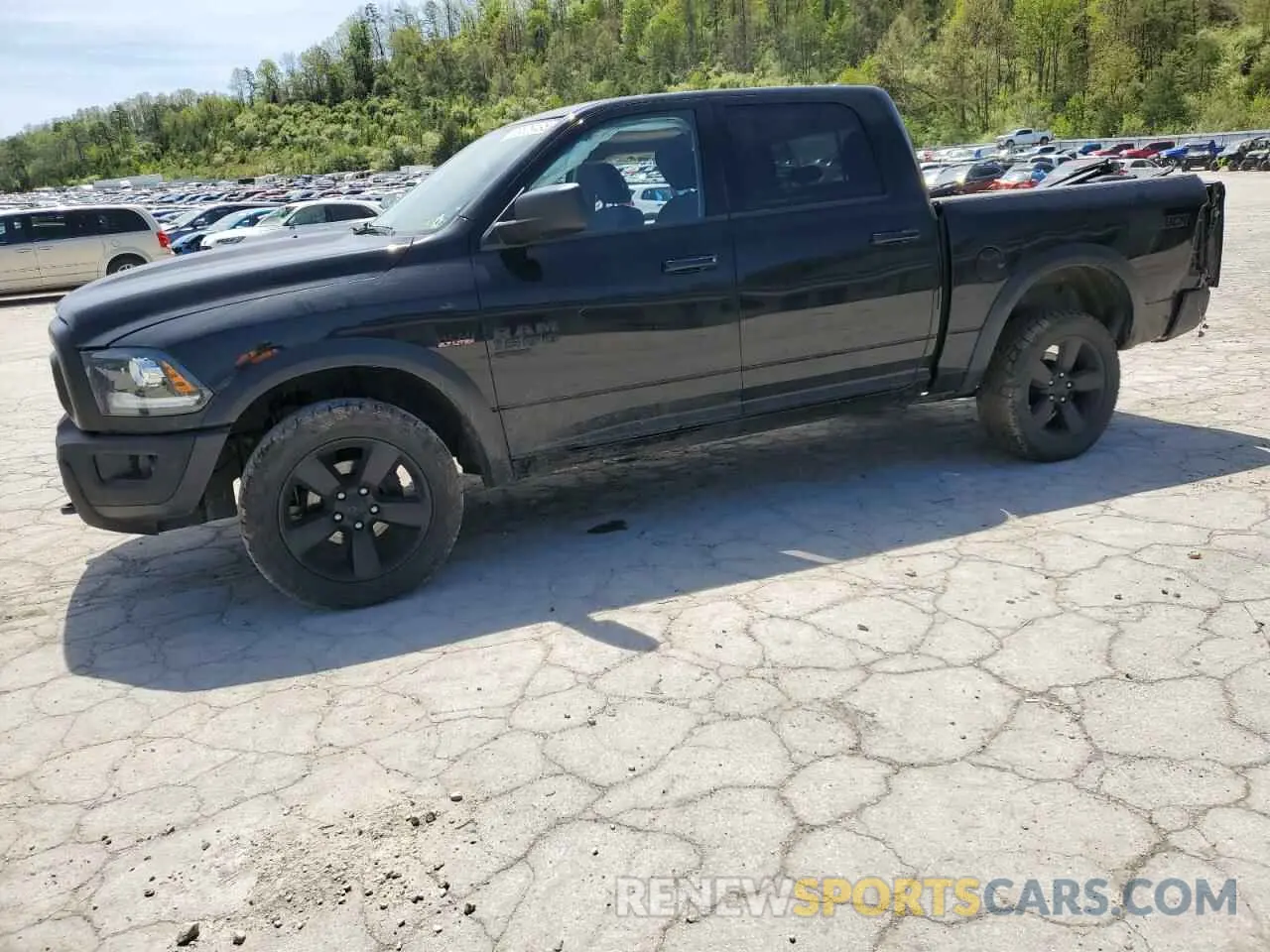 1 Photograph of a damaged car 1C6RR7LT1KS714908 RAM 1500 2019