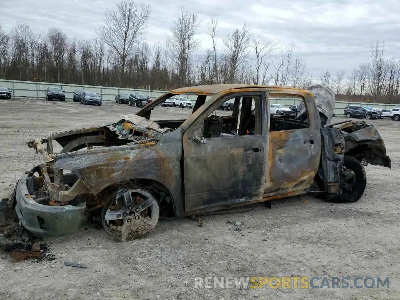 1 Photograph of a damaged car 1C6RR7LT1KS727612 RAM 1500 2019