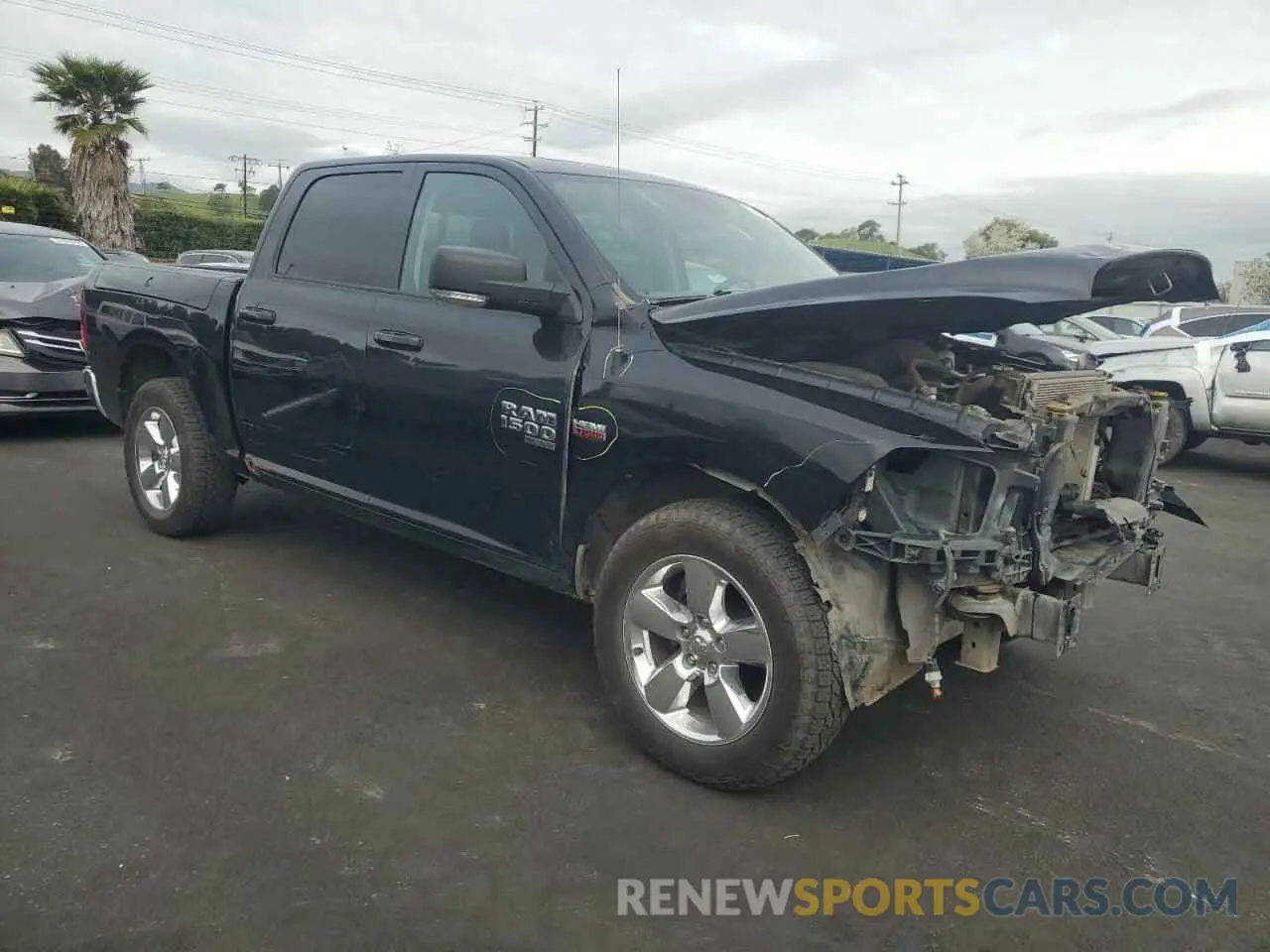 4 Photograph of a damaged car 1C6RR7LT2KS527502 RAM 1500 2019
