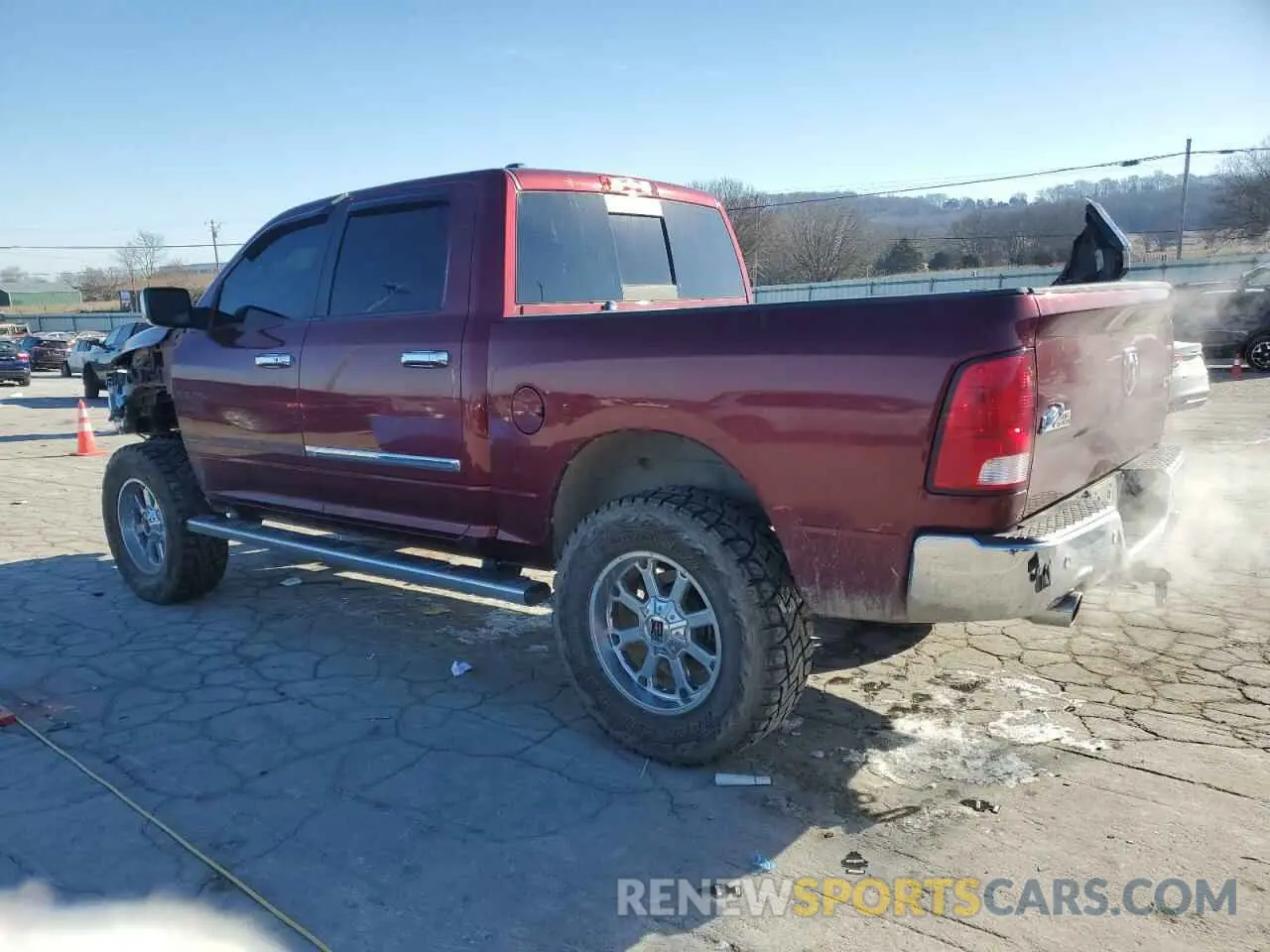 2 Photograph of a damaged car 1C6RR7LT3KS557141 RAM 1500 2019
