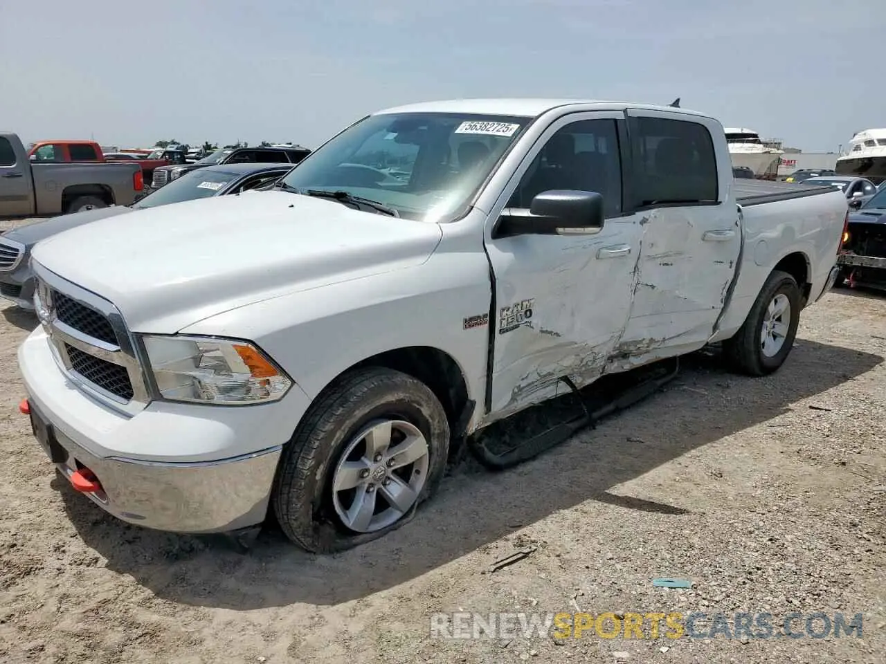 1 Photograph of a damaged car 1C6RR7LT5KS634186 RAM 1500 2019