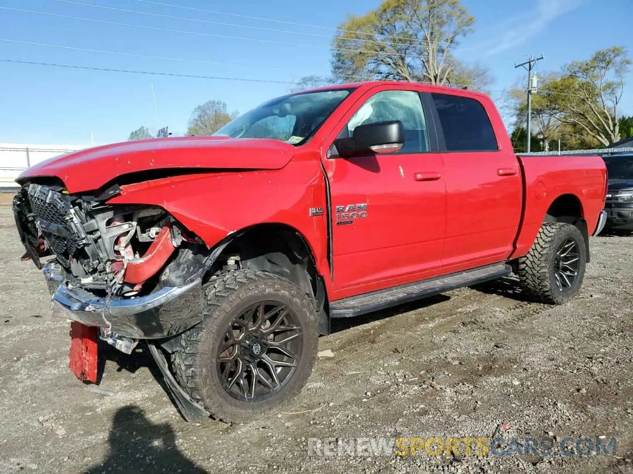 1 Photograph of a damaged car 1C6RR7LT7KS651362 RAM 1500 2019