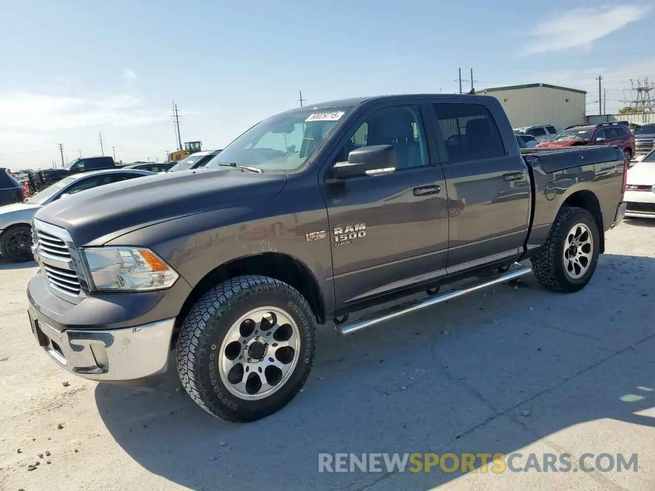 1 Photograph of a damaged car 1C6RR7LT9KS536536 RAM 1500 2019