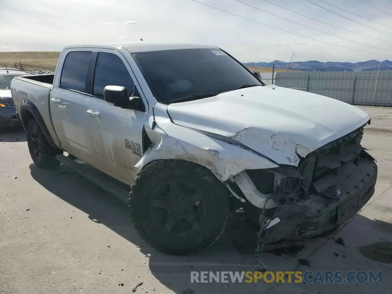 4 Photograph of a damaged car 1C6RR7LT9KS559024 RAM 1500 2019