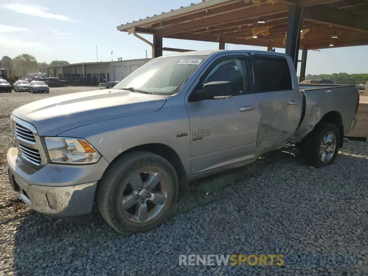 1 Photograph of a damaged car 1C6RR7LT9KS559878 RAM 1500 2019