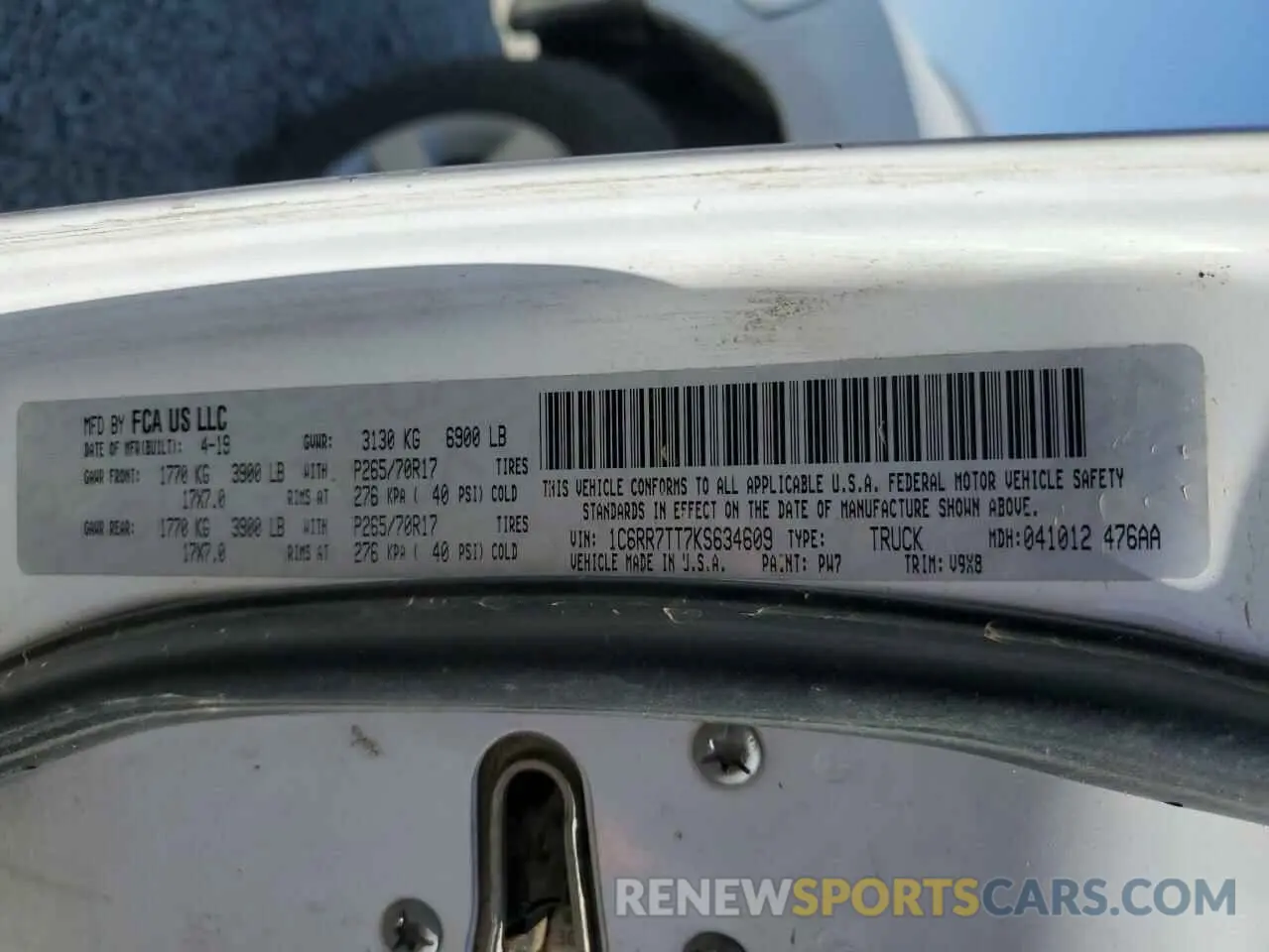 12 Photograph of a damaged car 1C6RR7TT7KS634609 RAM 1500 2019
