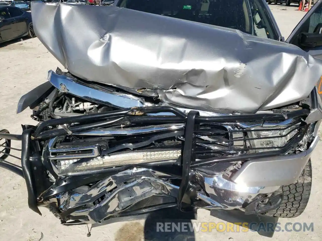 11 Photograph of a damaged car 1C6RREBG0KN792765 RAM 1500 2019