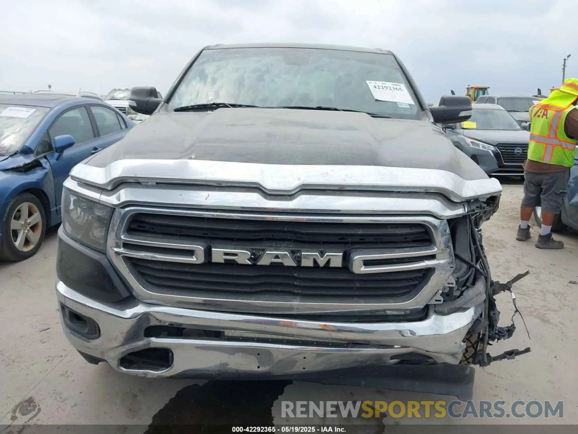 11 Photograph of a damaged car 1C6RREBG8KN728943 RAM 1500 2019