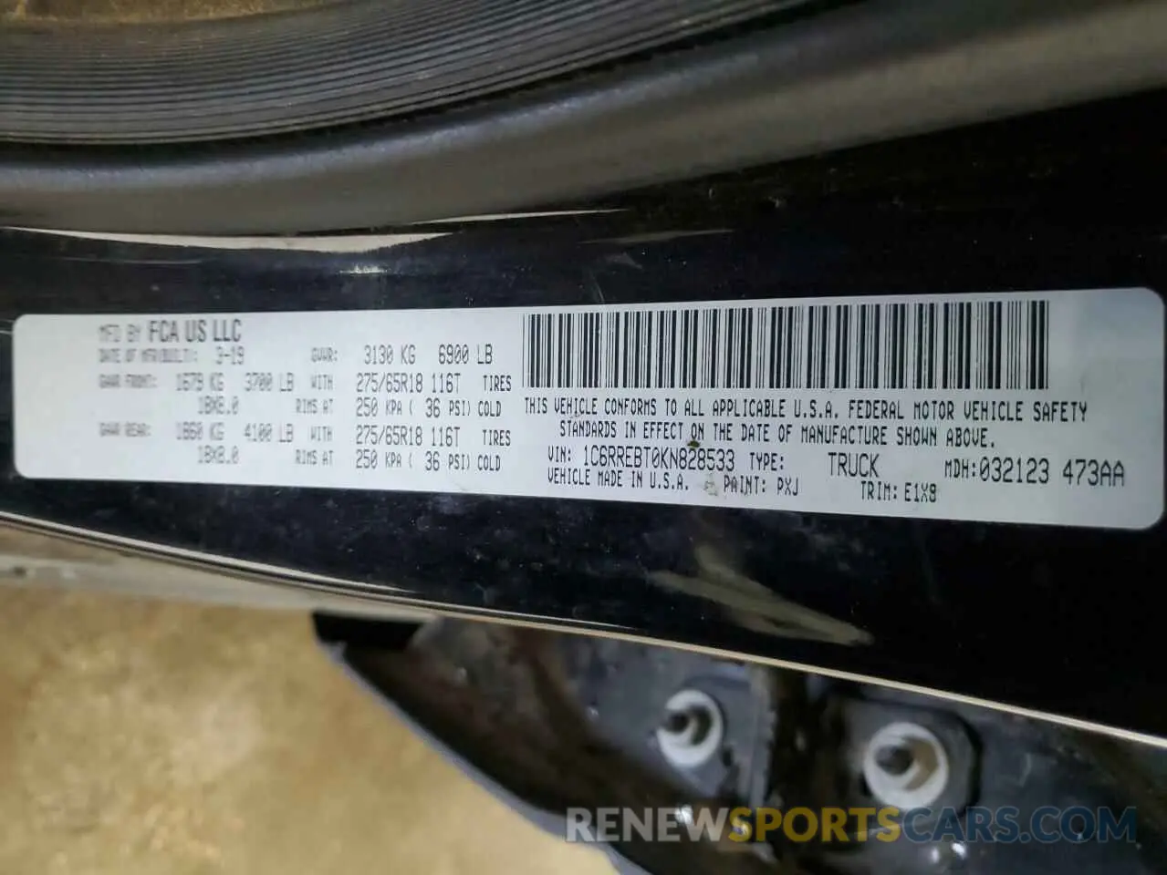 12 Photograph of a damaged car 1C6RREBT0KN828533 RAM 1500 2019