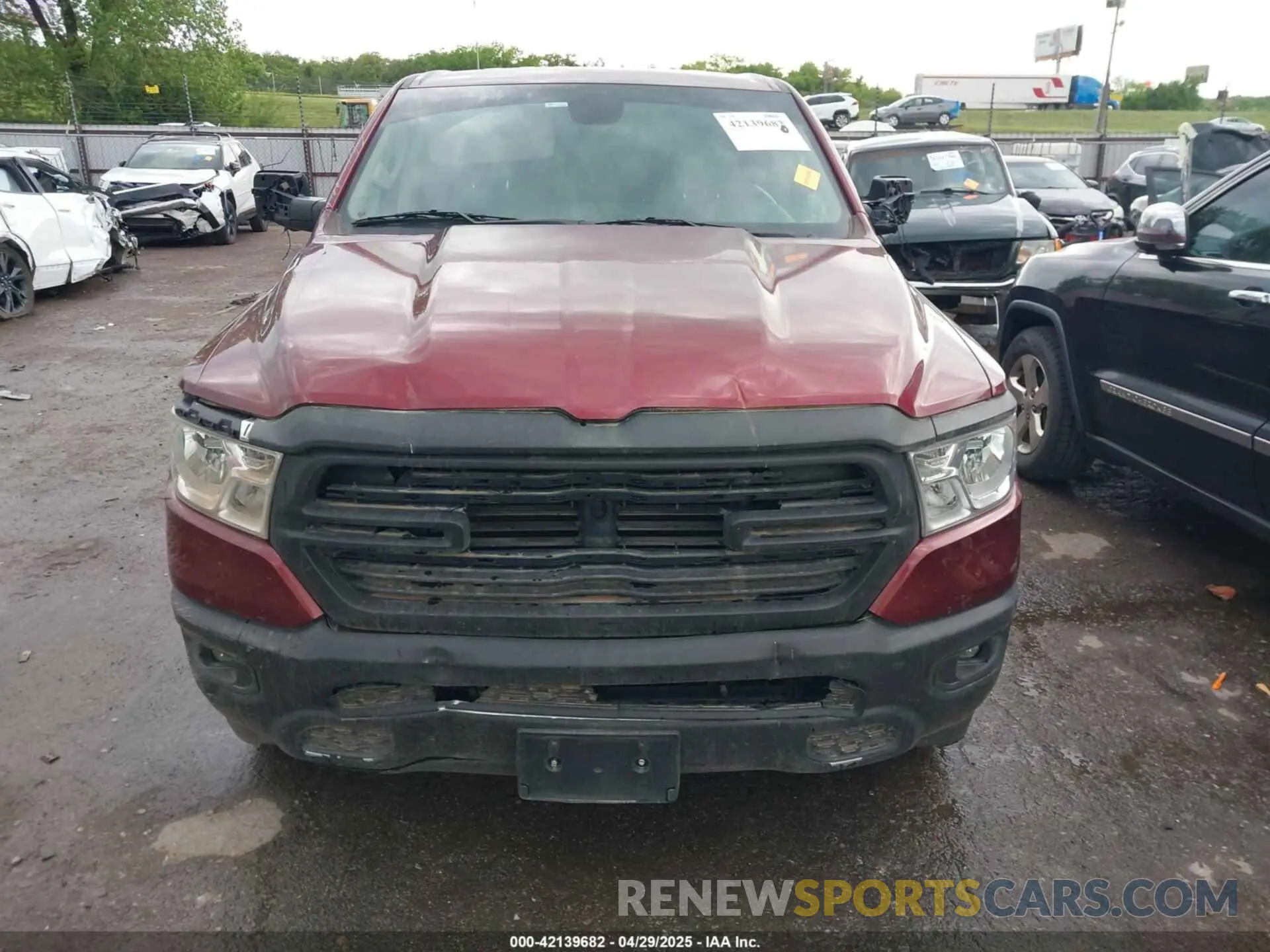 12 Photograph of a damaged car 1C6RREBT3KN884384 RAM 1500 2019