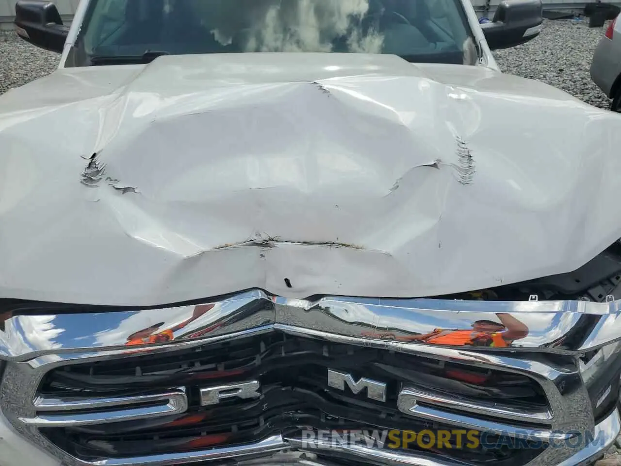 11 Photograph of a damaged car 1C6RREBT3KN905220 RAM 1500 2019