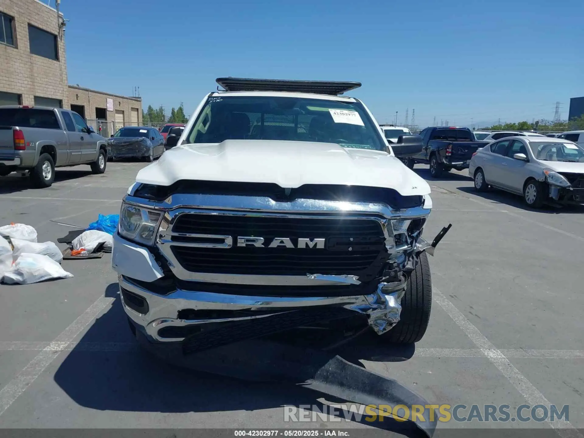 12 Photograph of a damaged car 1C6RRECT6KN884457 RAM 1500 2019