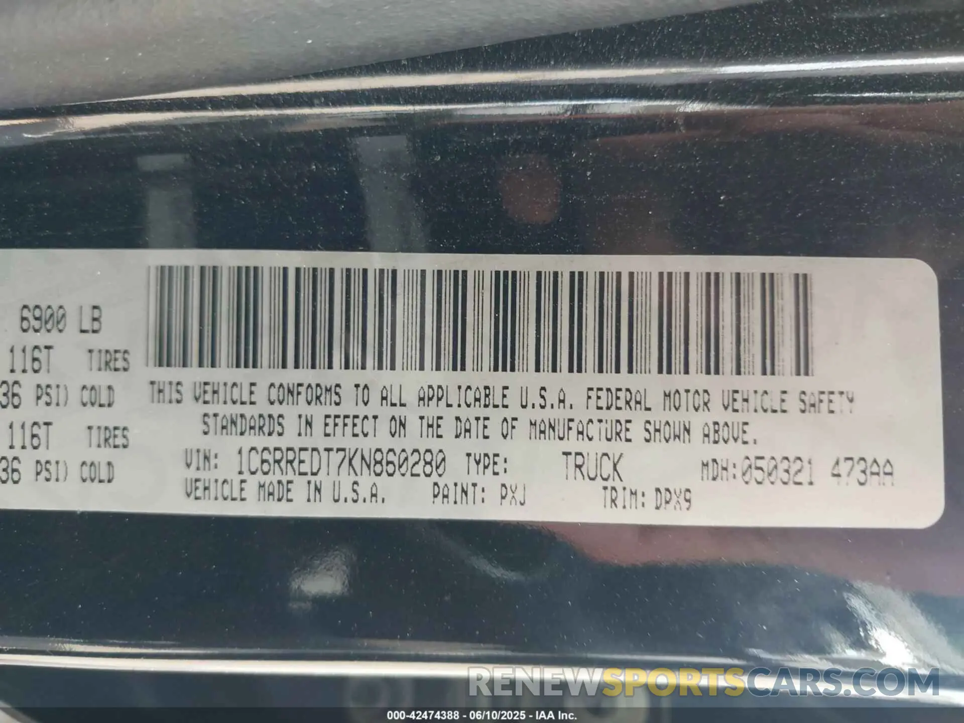 9 Photograph of a damaged car 1C6RREDT7KN860280 RAM 1500 2019