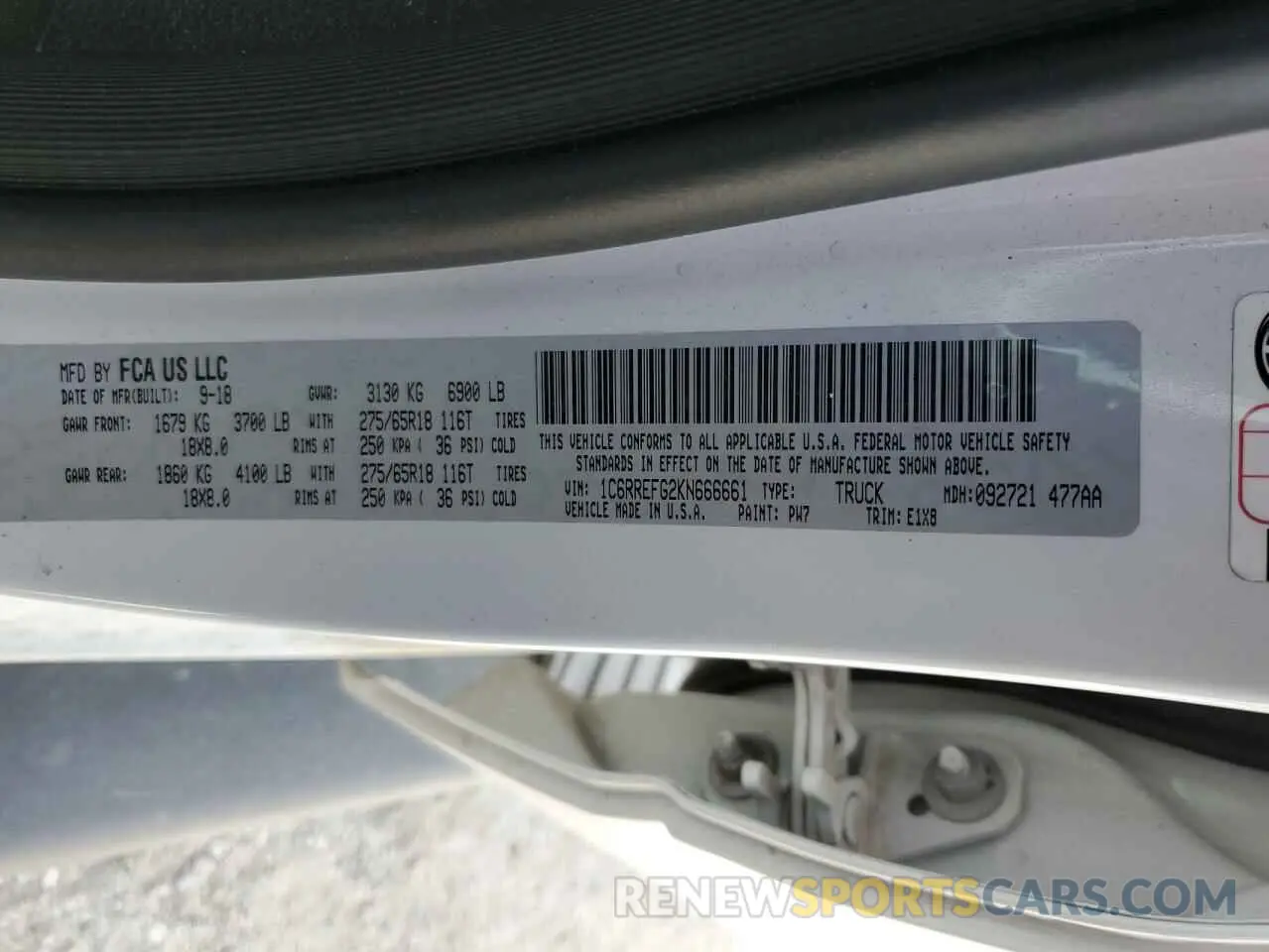 12 Photograph of a damaged car 1C6RREFG2KN666661 RAM 1500 2019