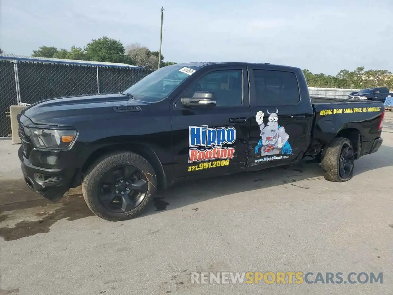 1 Photograph of a damaged car 1C6RREFT0KN701114 RAM 1500 2019