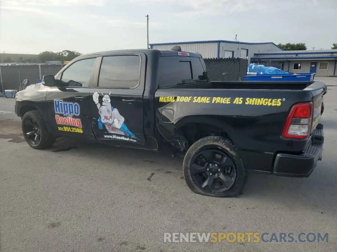 2 Photograph of a damaged car 1C6RREFT0KN701114 RAM 1500 2019