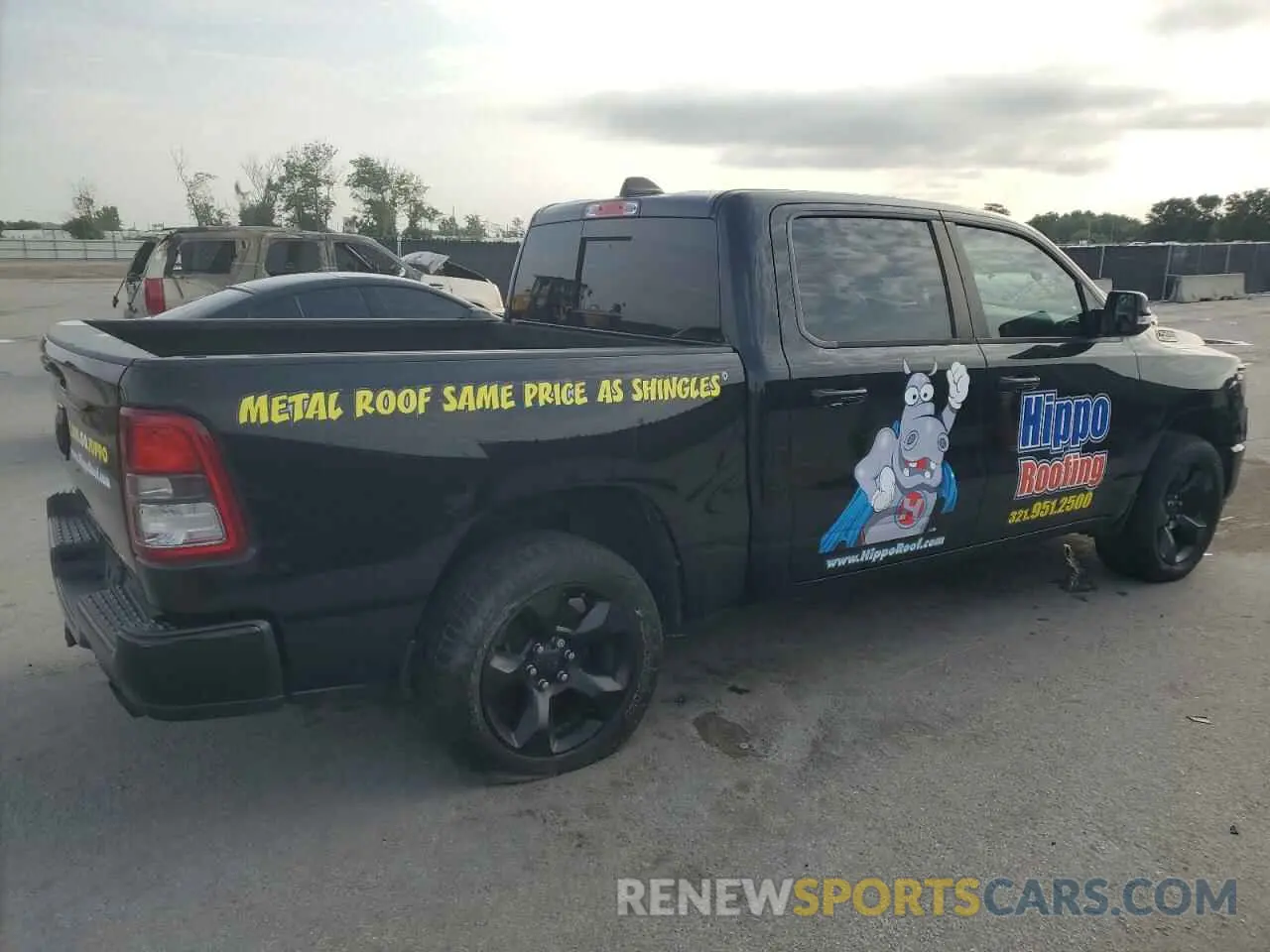 3 Photograph of a damaged car 1C6RREFT0KN701114 RAM 1500 2019