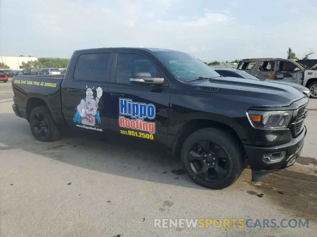 4 Photograph of a damaged car 1C6RREFT0KN701114 RAM 1500 2019