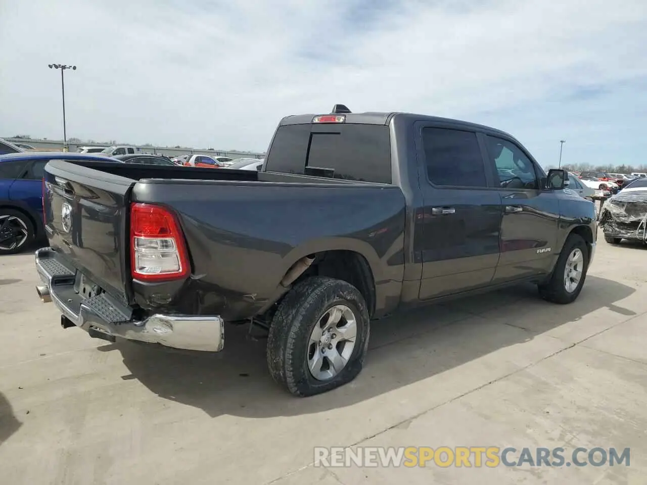 3 Photograph of a damaged car 1C6RREFT0KN745503 RAM 1500 2019