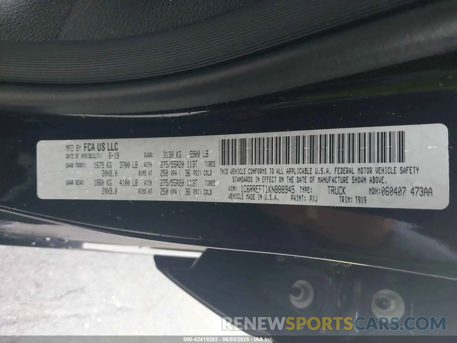 9 Photograph of a damaged car 1C6RREFT1KN888945 RAM 1500 2019