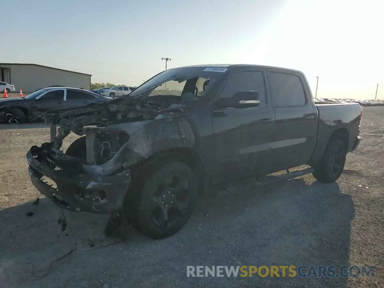 1 Photograph of a damaged car 1C6RREFT2KN616811 RAM 1500 2019