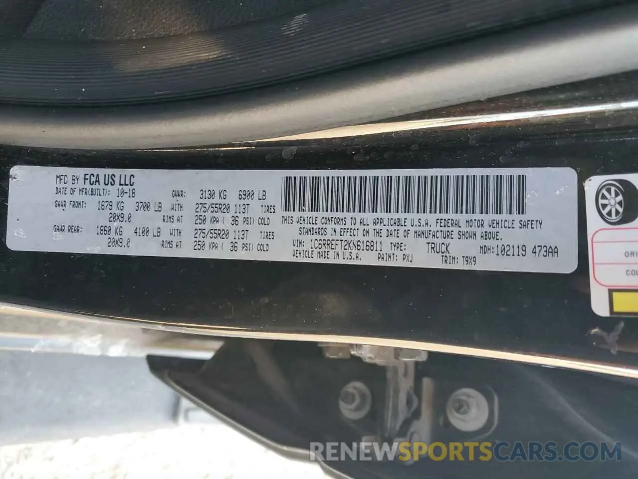 14 Photograph of a damaged car 1C6RREFT2KN616811 RAM 1500 2019