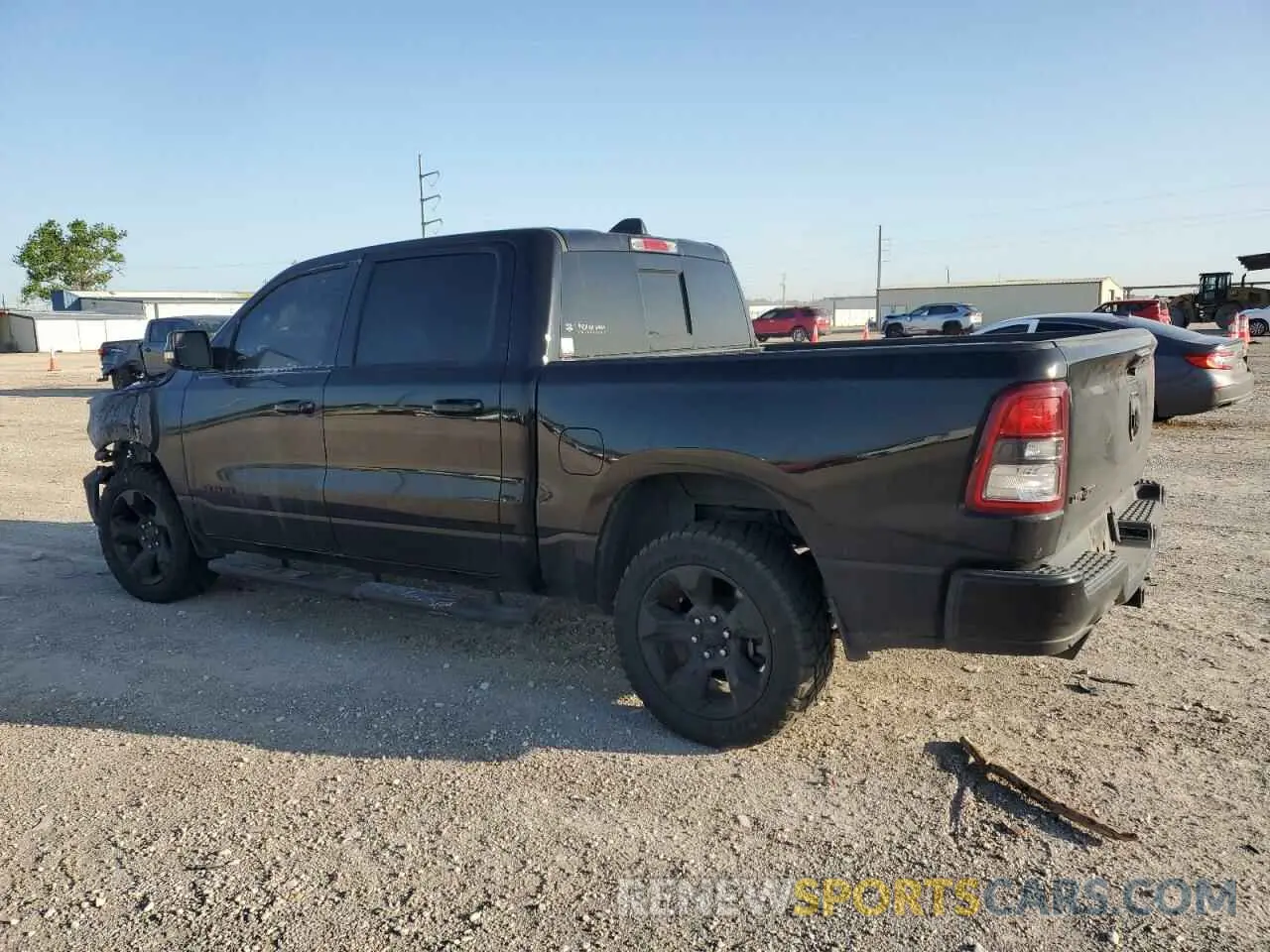 2 Photograph of a damaged car 1C6RREFT2KN616811 RAM 1500 2019
