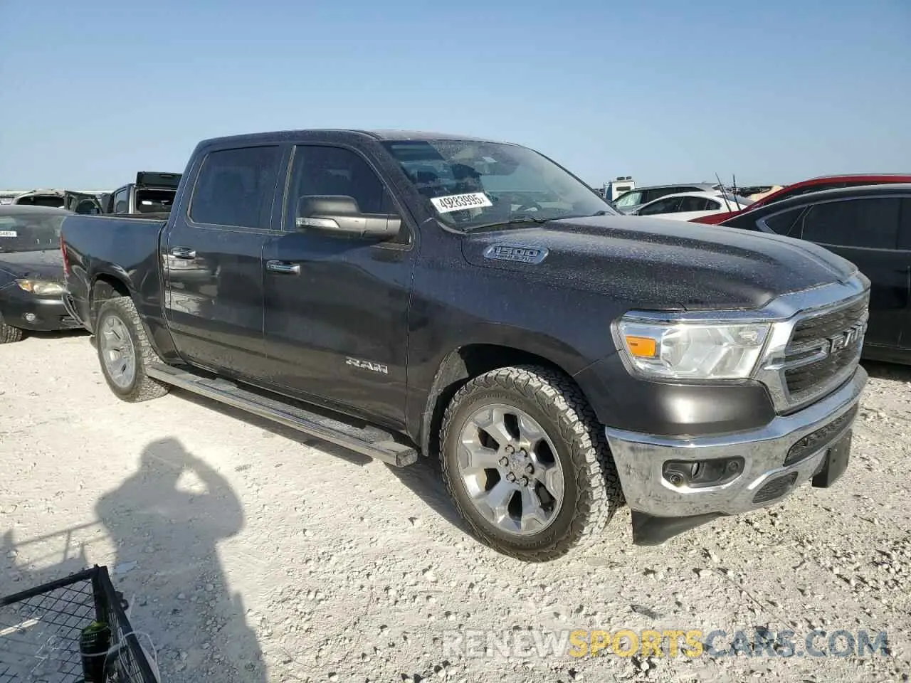 4 Photograph of a damaged car 1C6RREFT2KN798512 RAM 1500 2019